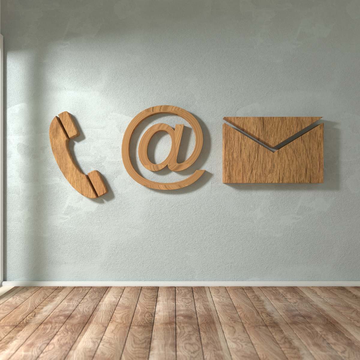 large wooden contact symbols on a wall